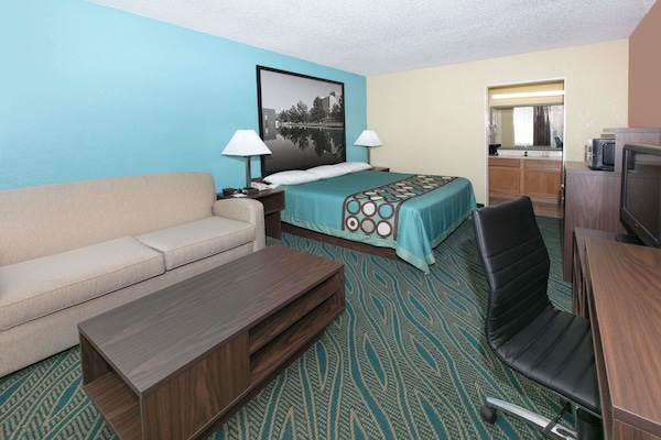 Desk, laptop workspace, blackout drapes, free cribs/infant beds