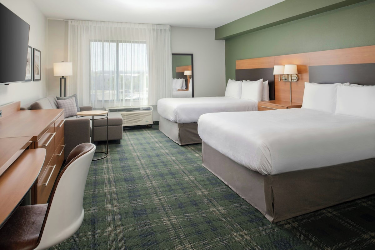 Premium bedding, individually furnished, laptop workspace