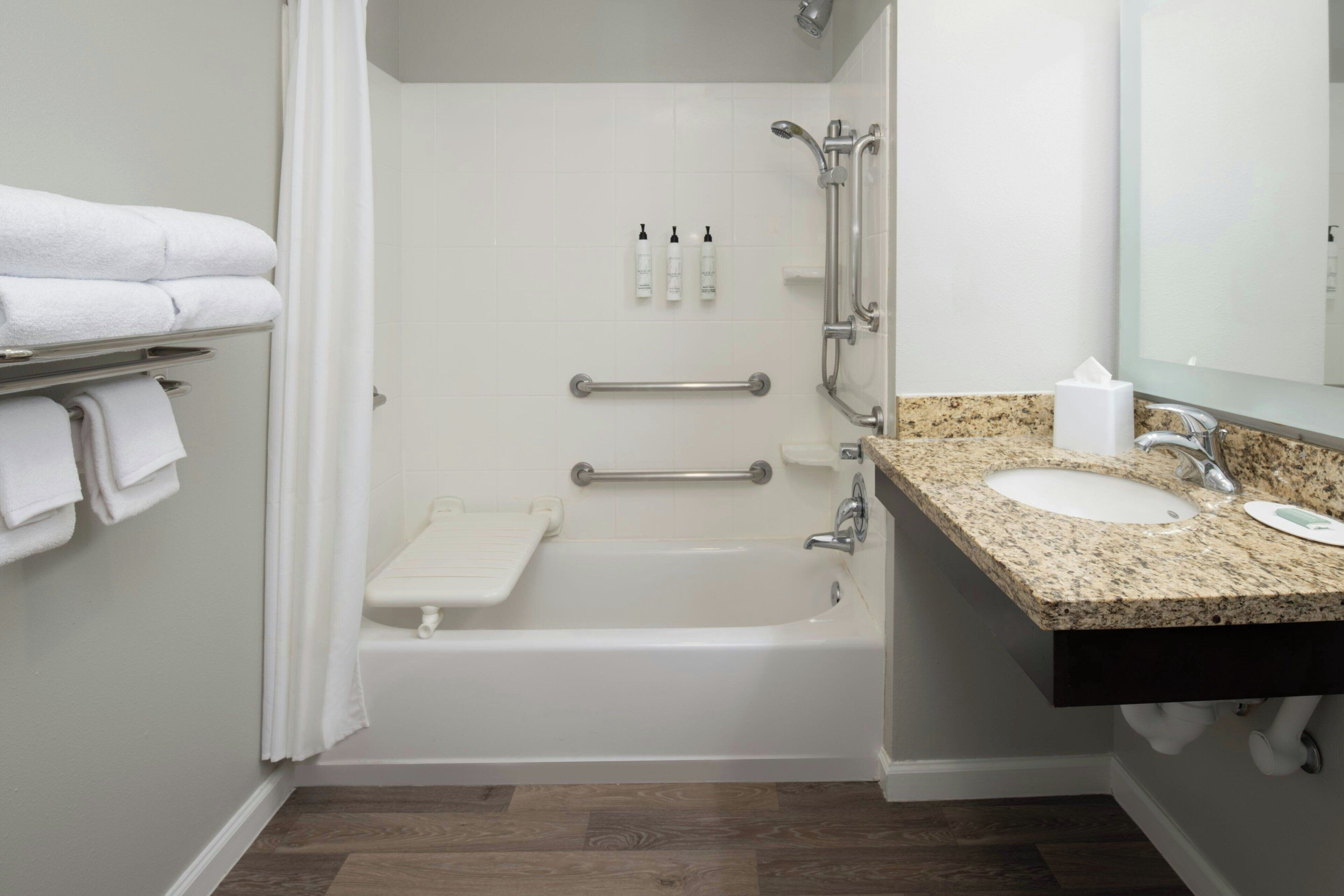 suite, 2 queen beds | bathroom | combined shower/bathtub, free toiletries, hair dryer, towels