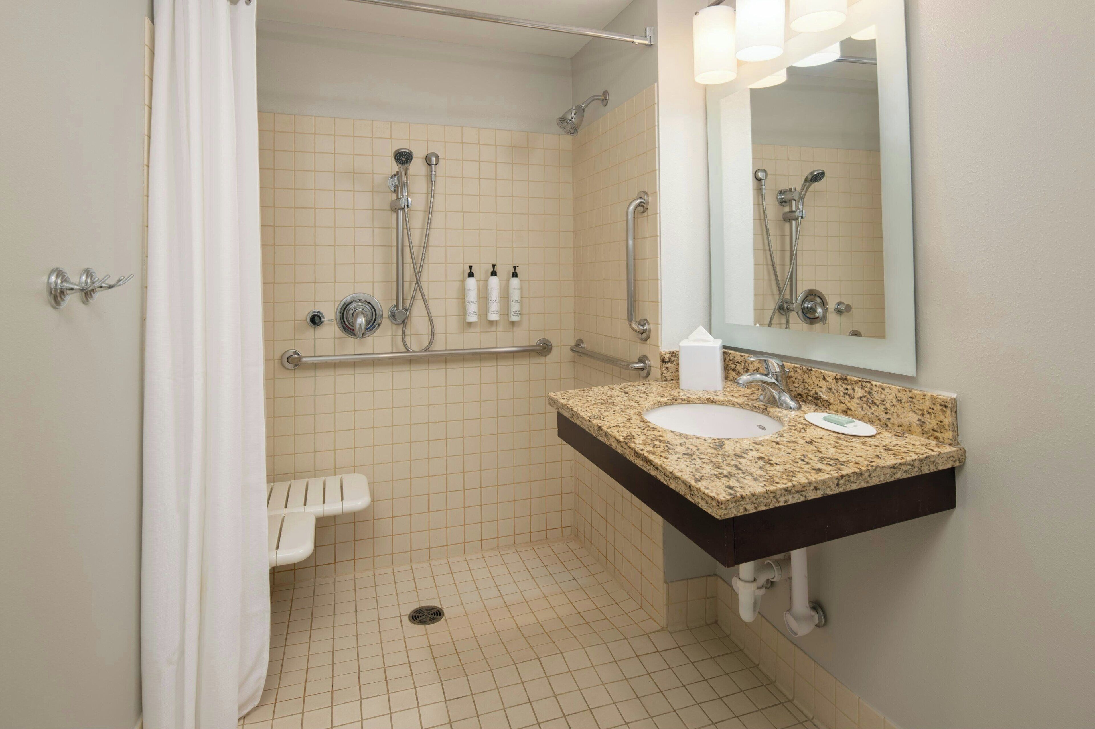 suite, 2 queen beds | bathroom | combined shower/bathtub, free toiletries, hair dryer, towels