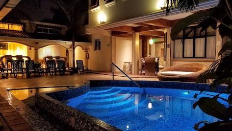 Outdoor pool, open 8:00 AM to 10:00 PM, sun loungers