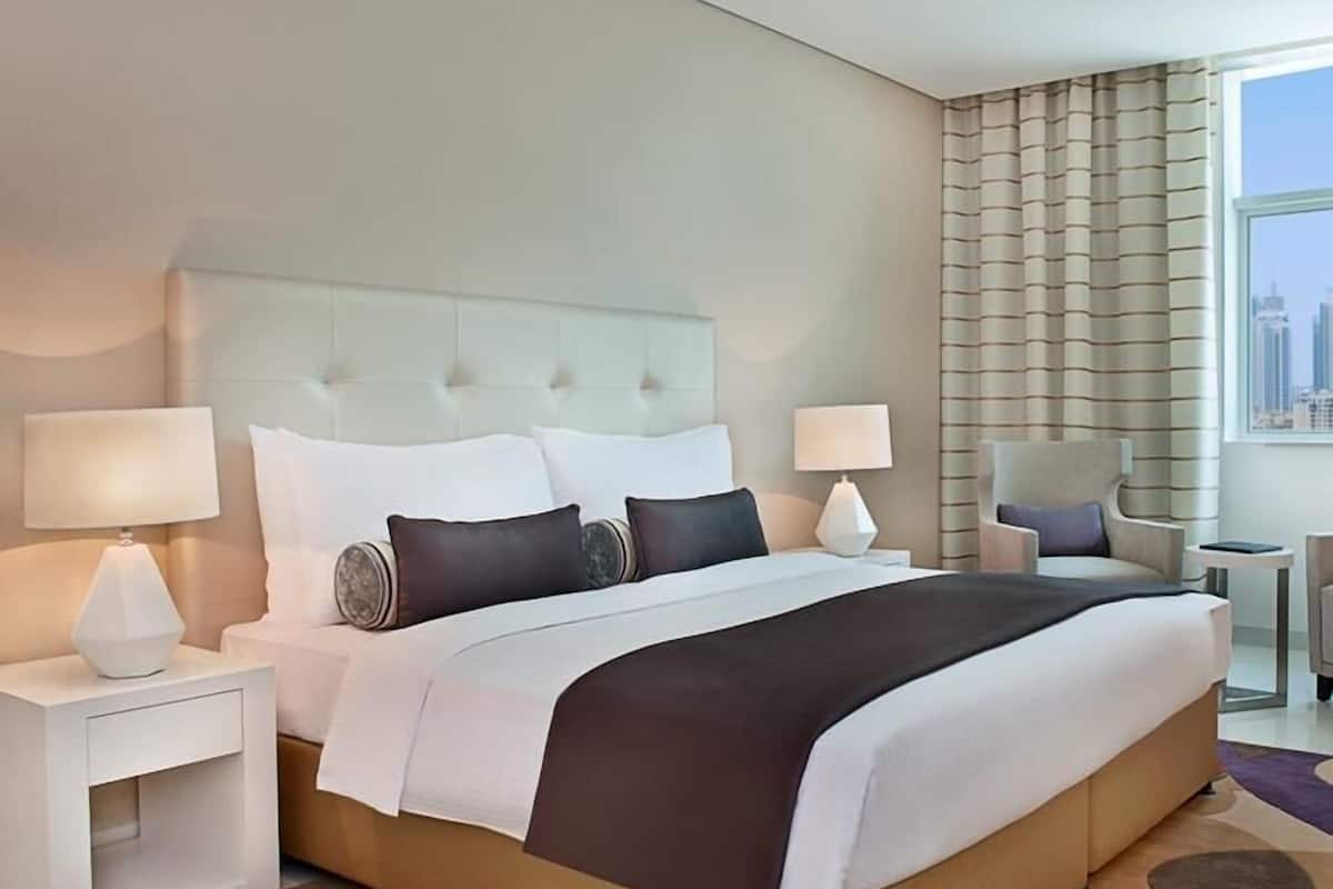 Premium bedding, in-room safe, desk, soundproofing