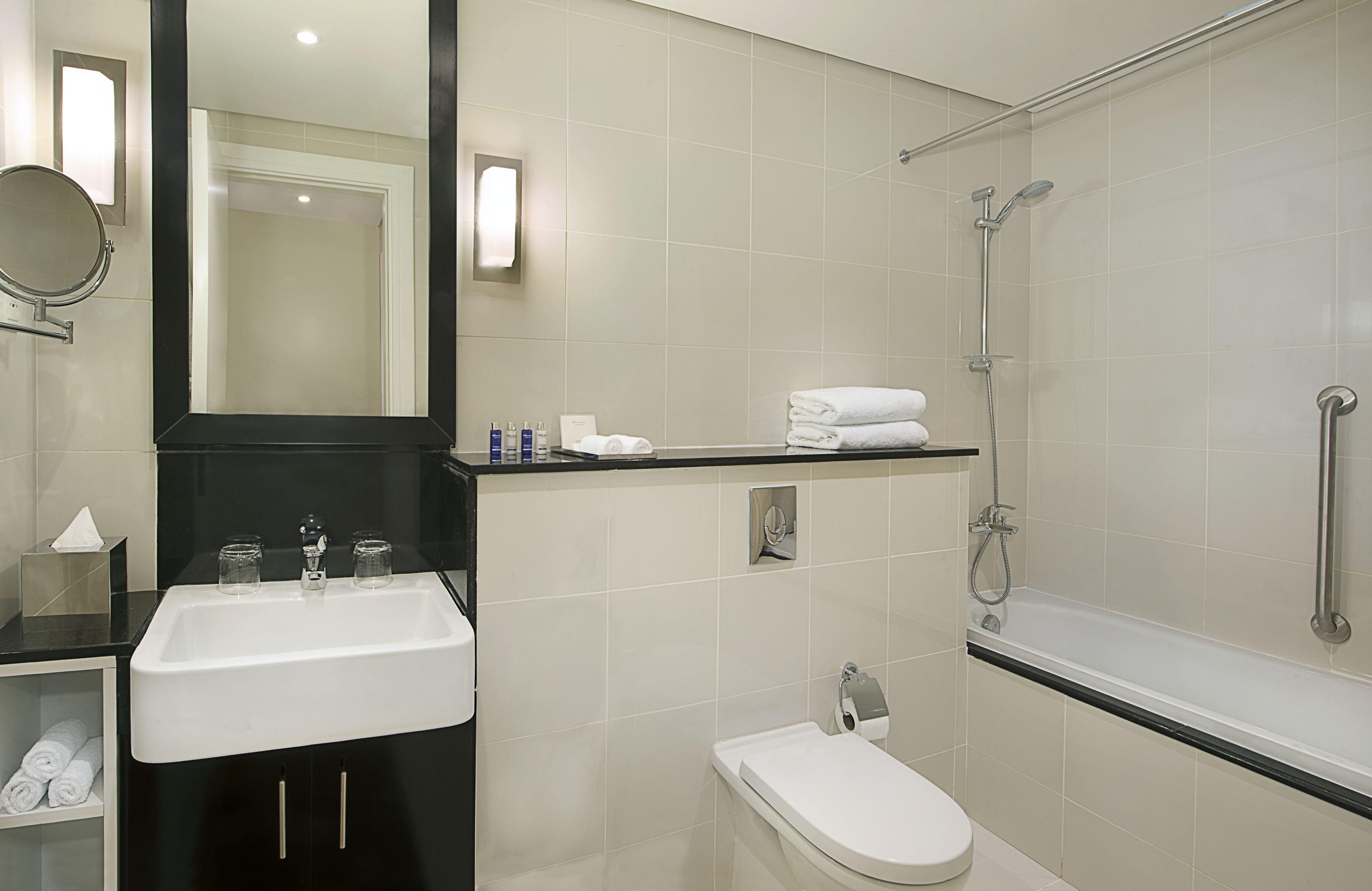 combined shower/bathtub, free toiletries, hair dryer, bathrobes