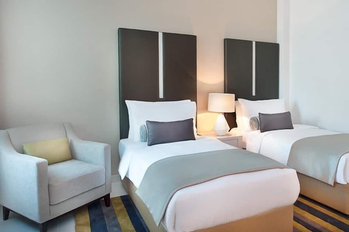 Premium bedding, in-room safe, desk, soundproofing