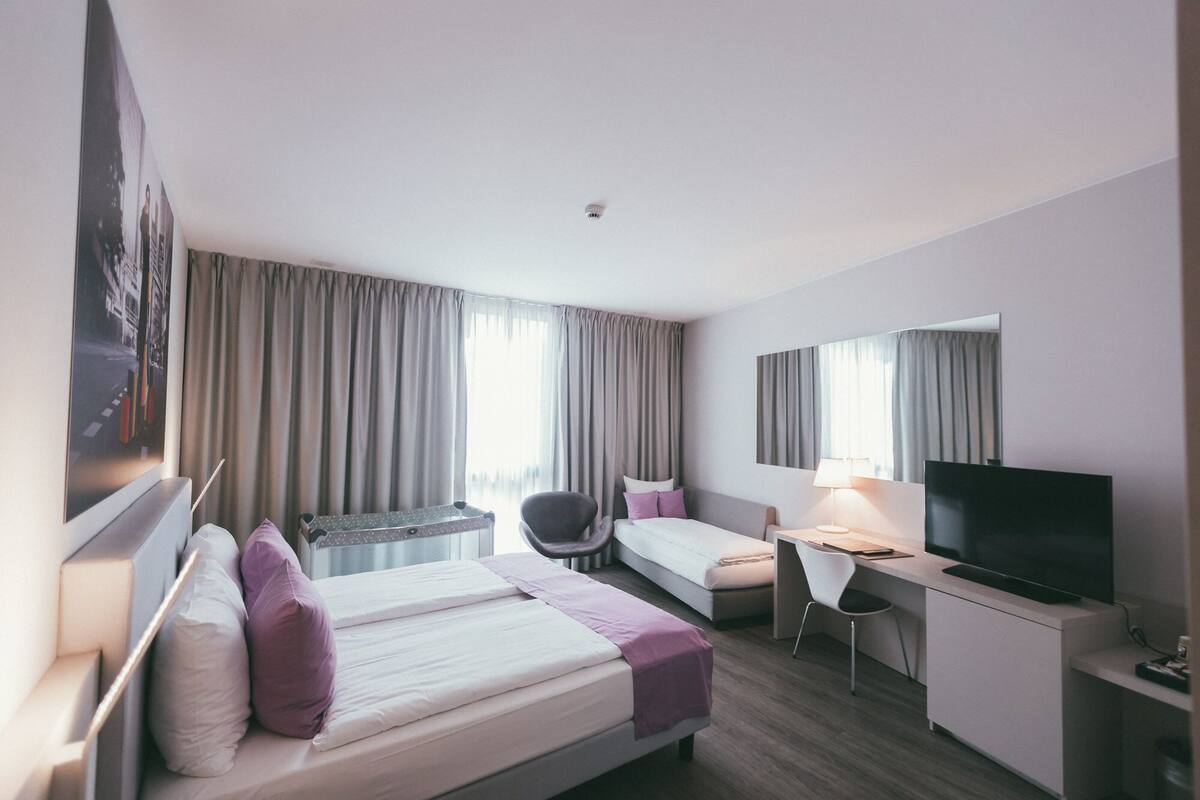 family room, 2 seperate bedrooms | minibar, in-room safe, desk, laptop workspace