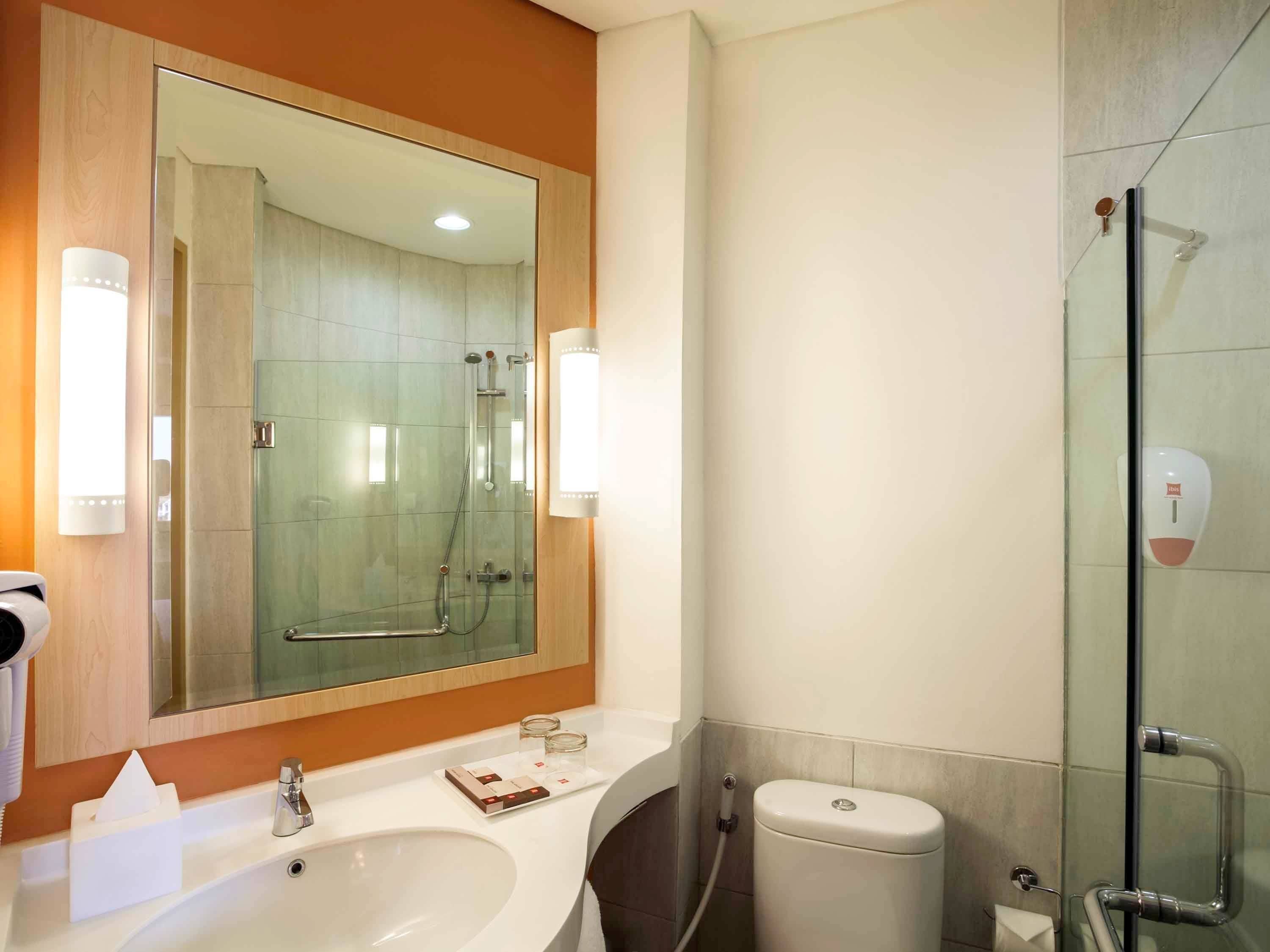 Shower, eco-friendly toiletries, hair dryer, slippers