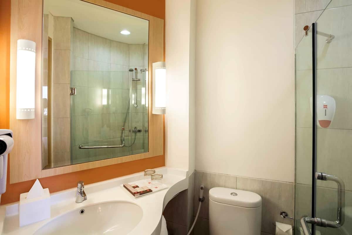 Shower, eco-friendly toiletries, hair dryer, slippers