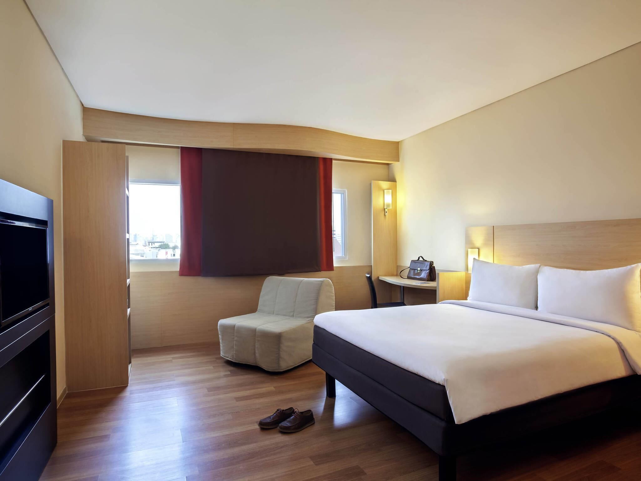 Standard Room, Multiple Beds | Minibar, in-room safe, desk, laptop workspace