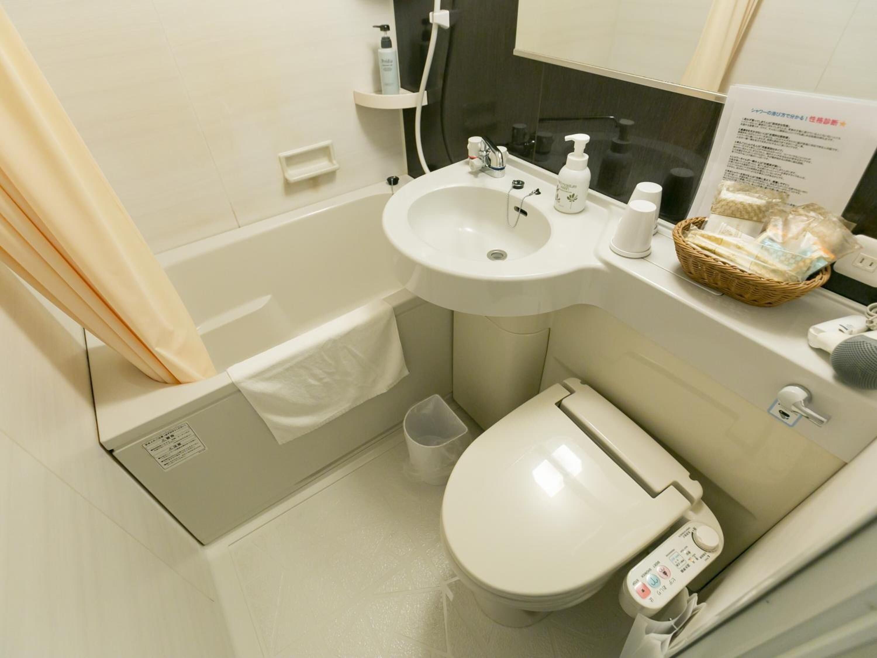 shower, hair dryer, slippers, electronic bidet