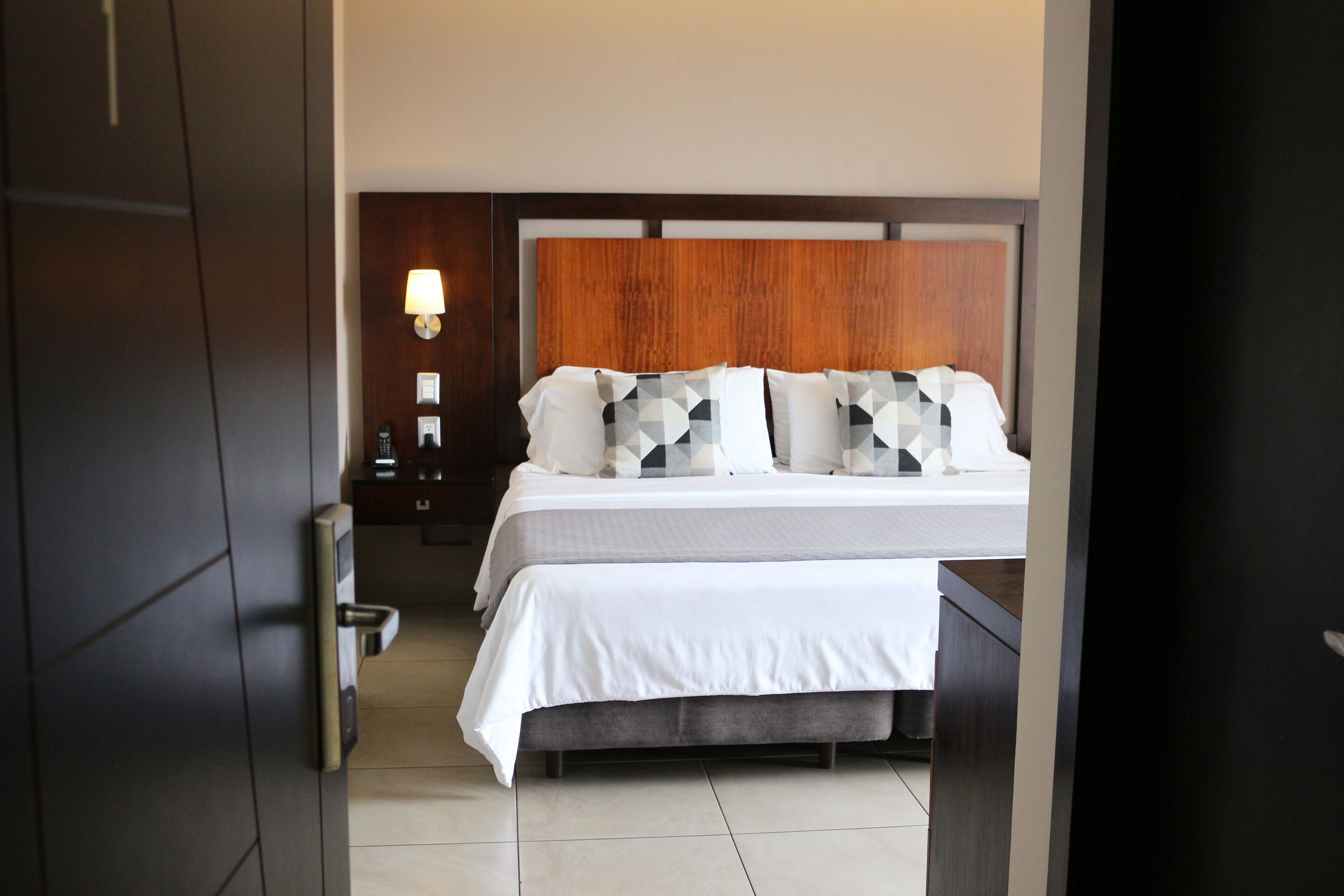 king room balcony and harbour view | premium bedding, minibar, in-room safe, soundproofing