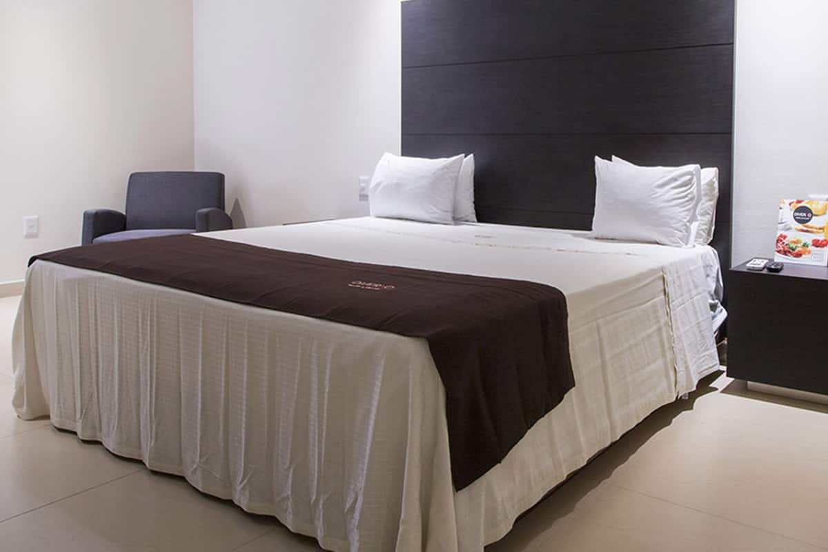 Deluxe Suite, Jetted Tub | In-room safe, desk, free WiFi, bed sheets