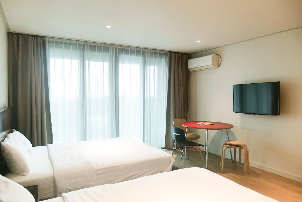 Premium bedding, blackout curtains, free WiFi, bed sheets