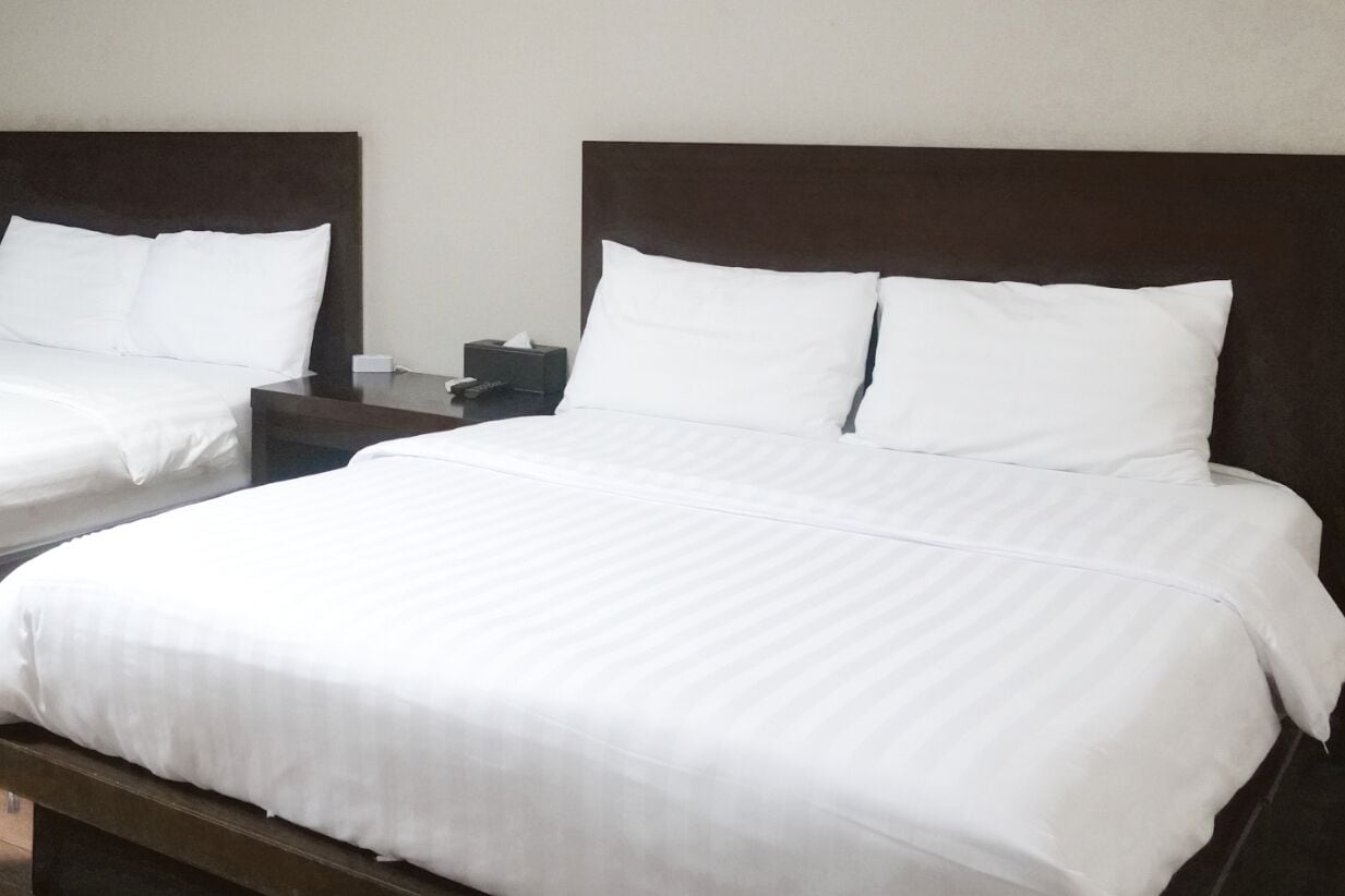 Premium bedding, blackout curtains, free WiFi, bed sheets