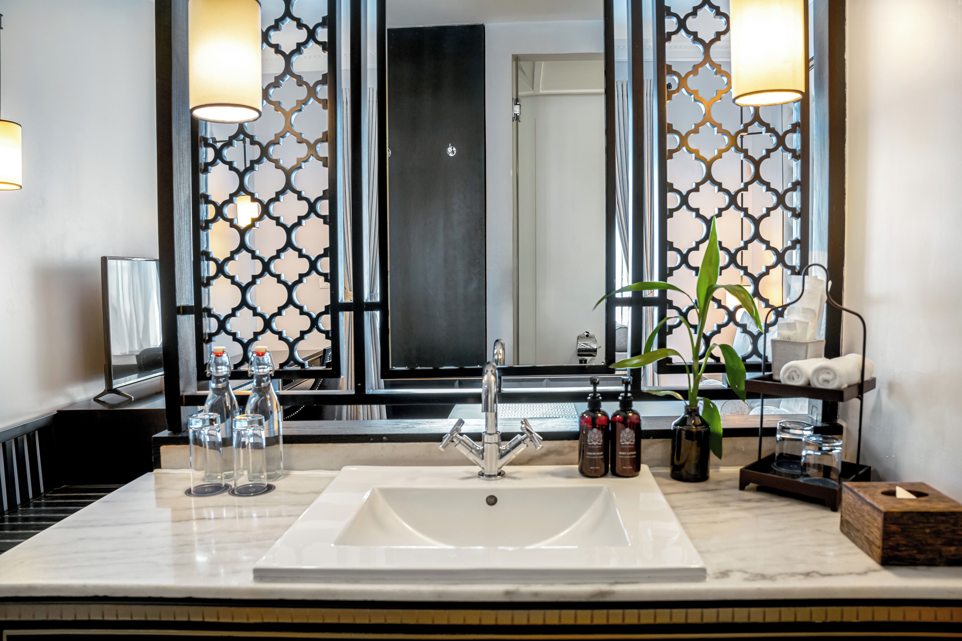 gold chamber double pool view | bathroom | eco-friendly toiletries, hair dryer, bathrobes, slippers