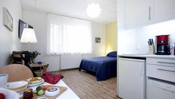 Superior-studiolejlighed | Premium-sengetøj, senge med madrasser af memory foam, skrivebord