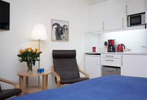 Estúdio superior | Cozinha privada | Geladeira, micro-ondas, cooktop, lava-louças
