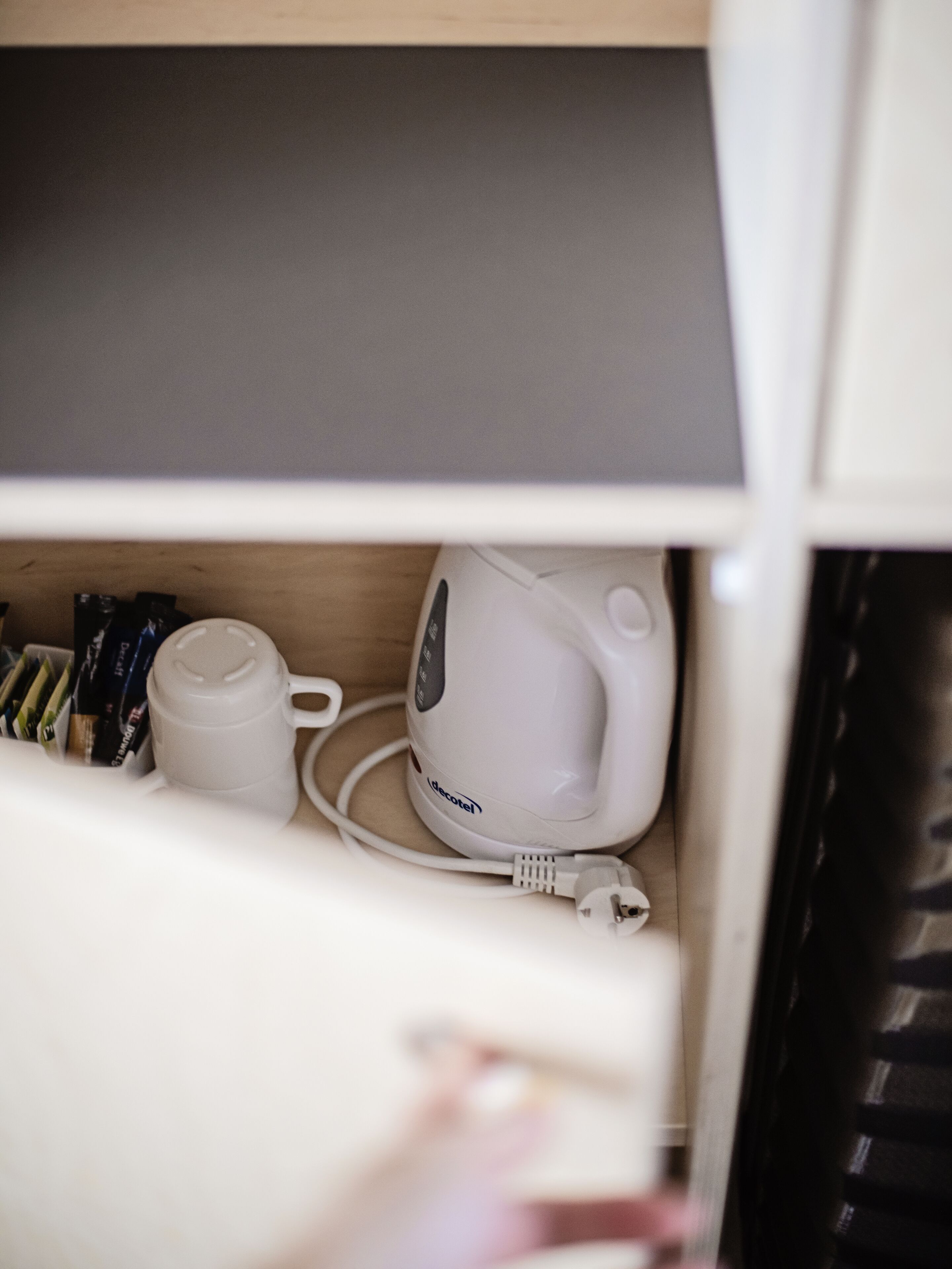 desk, blackout curtains, soundproofing, cots/infant beds