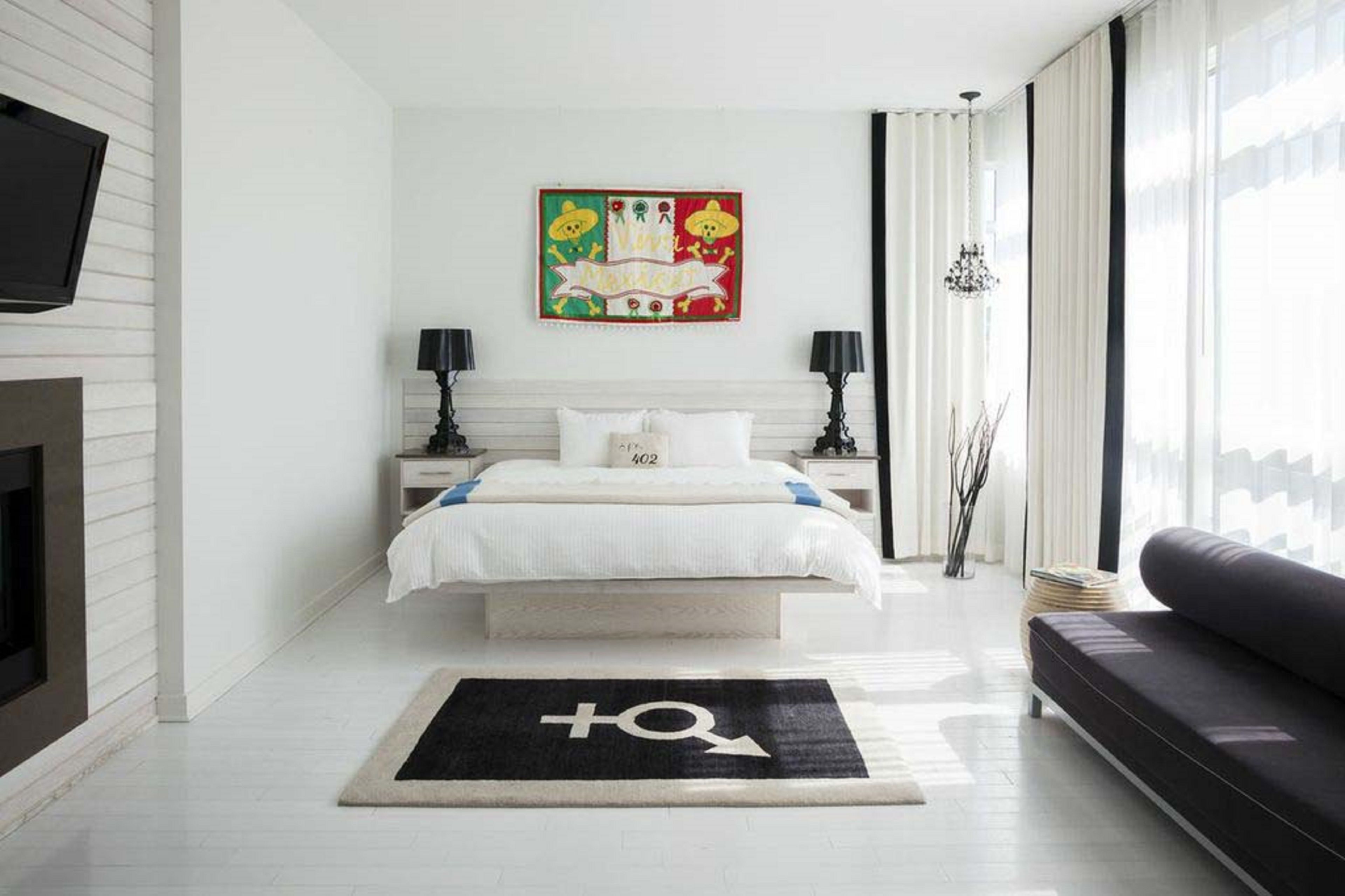 junior studio suite, 1 king bed, fireplace (hang loose) | premium bedding, down duvets, in-room safe, individually decorated