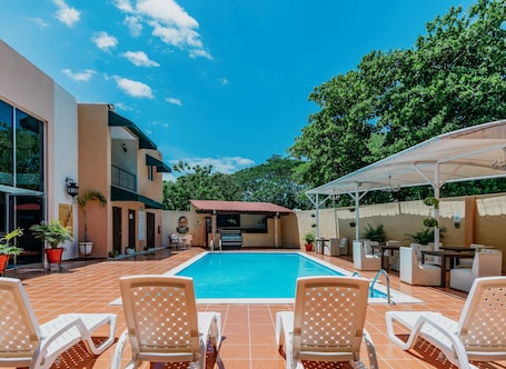 Outdoor pool, open 10:00 AM to 9:00 PM, sun loungers