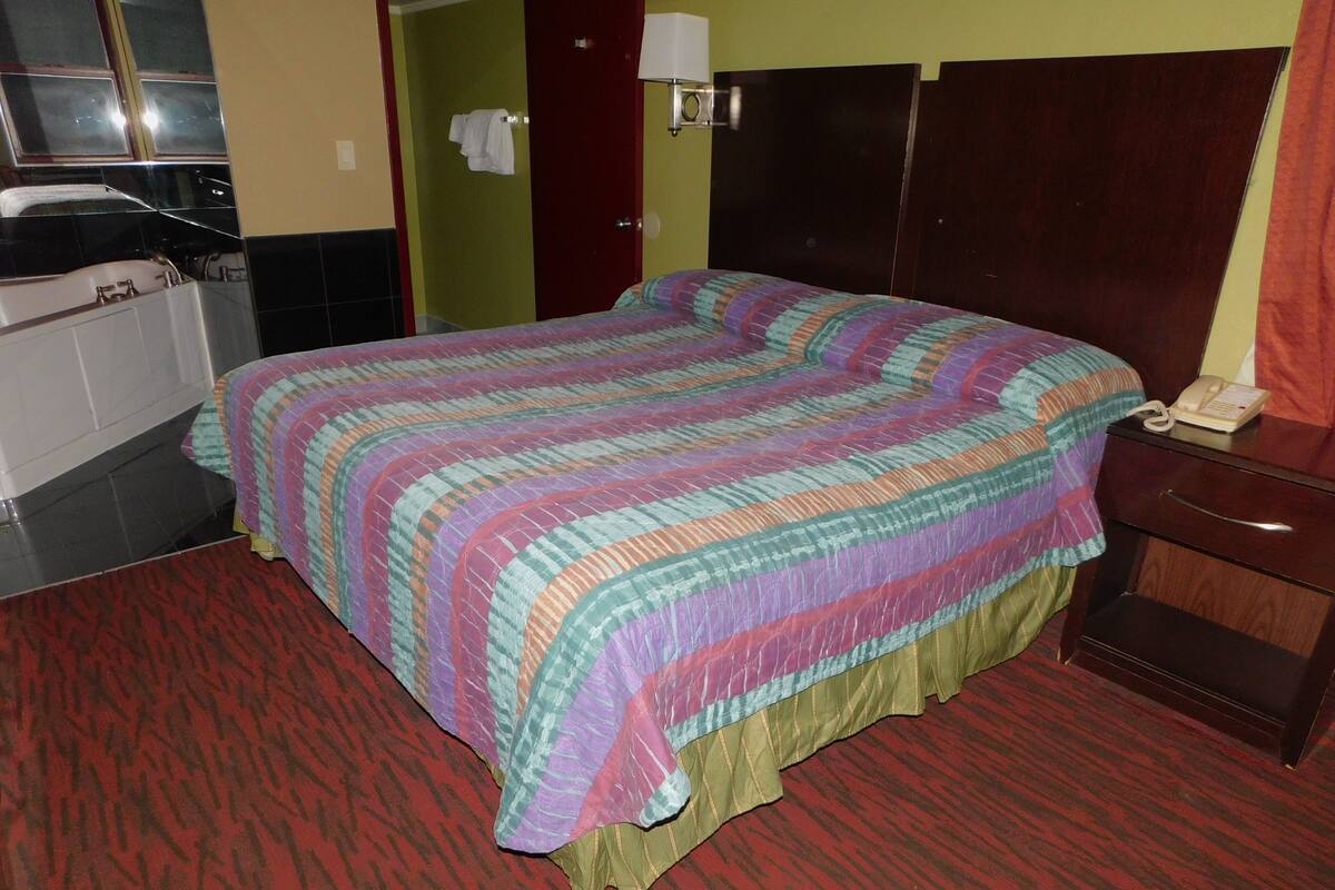 Chambre, 1 très grand lit, non-fumeur | Literie de qualité, système d’insonorisation, fer et planche à repasser