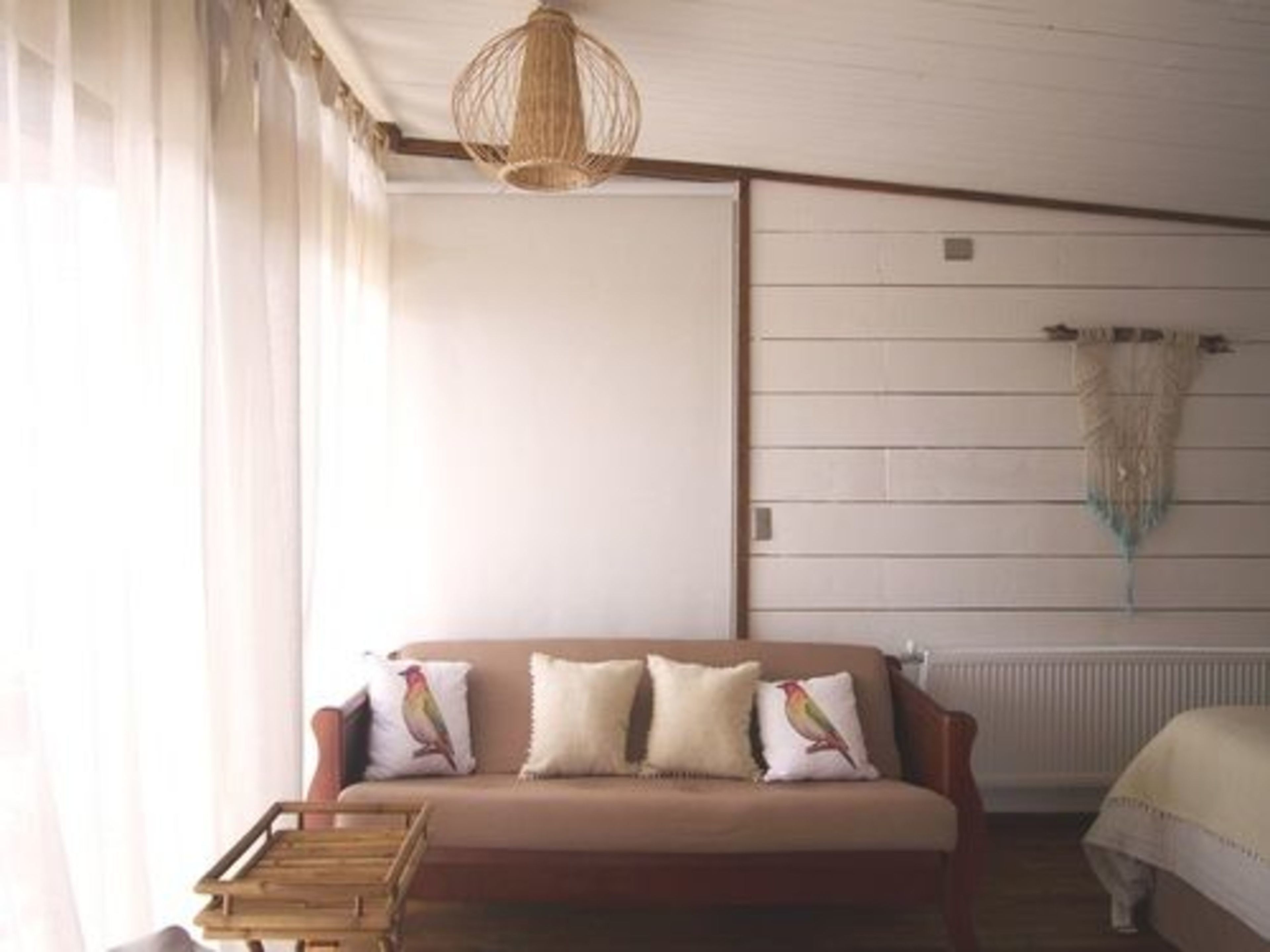 deluxe suite | living area | flat-screen tv