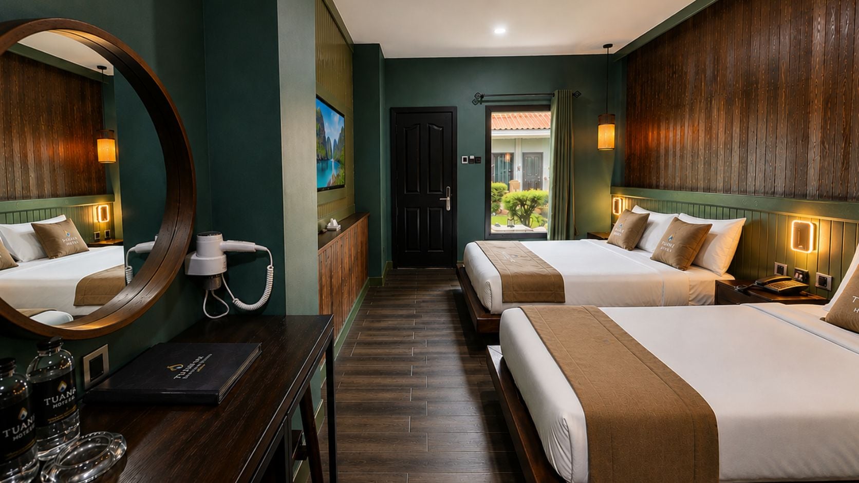 A hotel room with two beds, a mirror, a hairdryer, a minibar, and a view of the outdoors.
