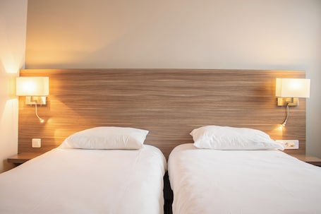 Ropa de cama de alta calidad, escritorio y sistema de insonorización