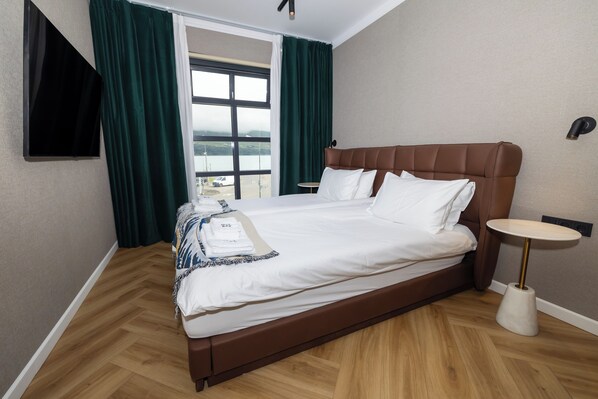 Habitación superior | Ropa de cama de alta calidad y edredón 