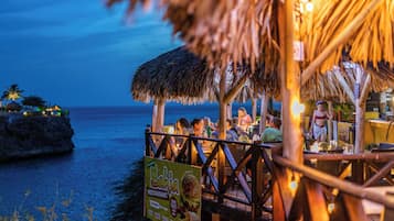 Lunch, dinner served; international cuisine, beach views