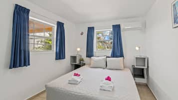 Apartment, 4 Bedrooms, Beachside (Ground Floor) | 1 bedroom, premium bedding, down comforters, in-room safe
