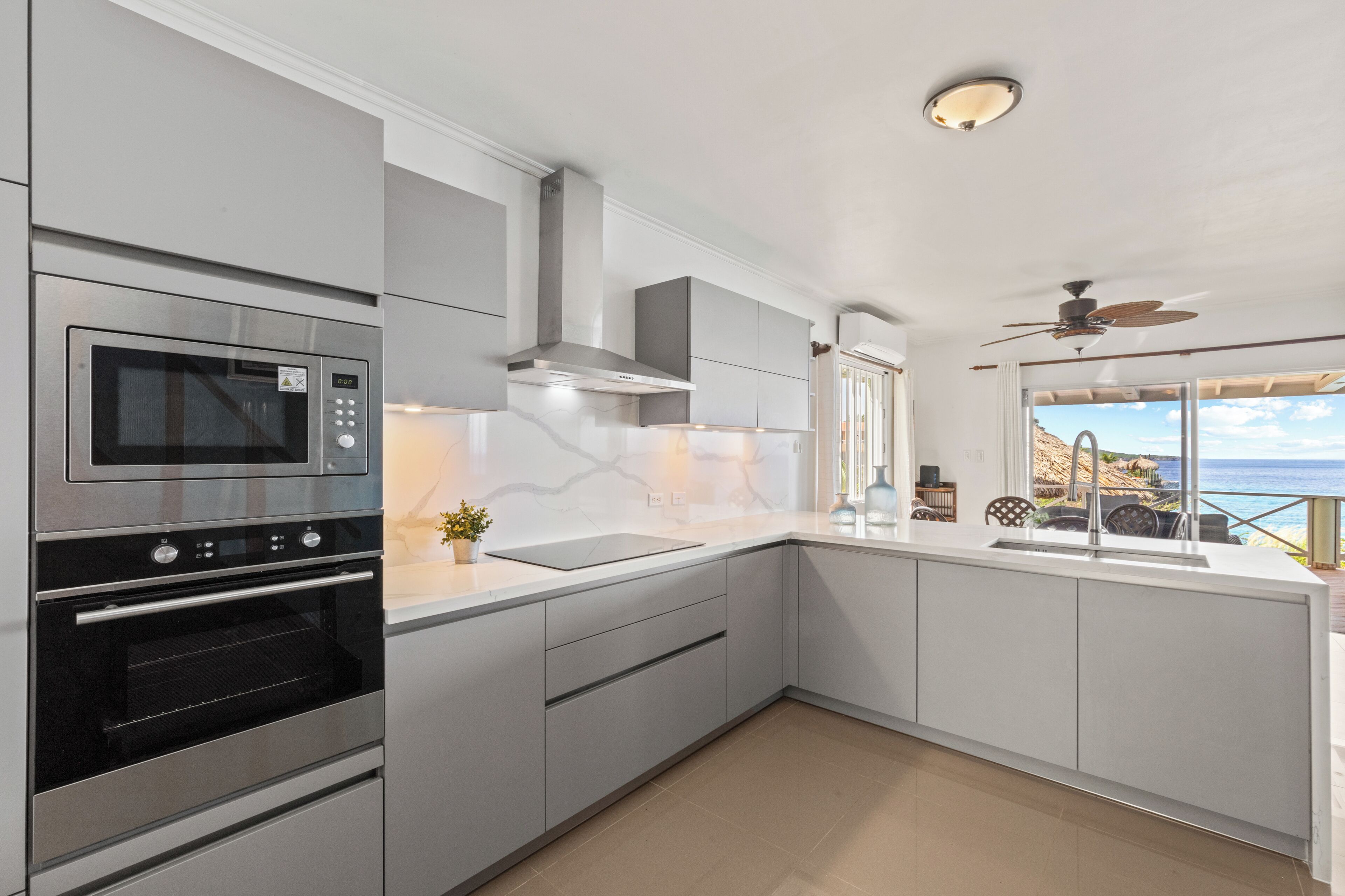 exclusive villa, 2 bedrooms, jetted tub, ocean view | private kitchen | full-sized fridge, stovetop, coffee/tea maker, electric kettle