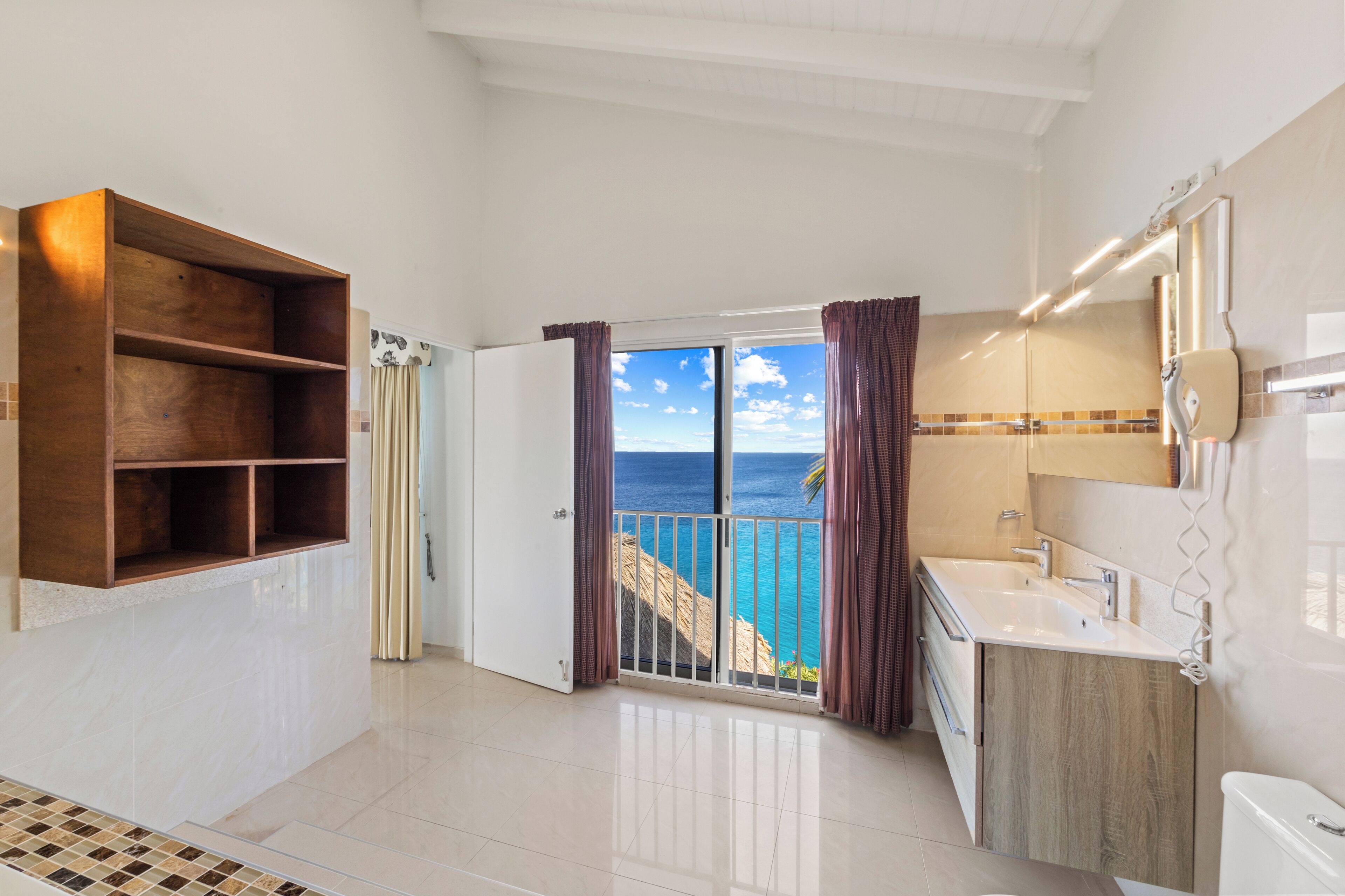 exclusive villa, 2 bedrooms, jetted tub, ocean view | bathroom | combined shower/bathtub, hair dryer, towels