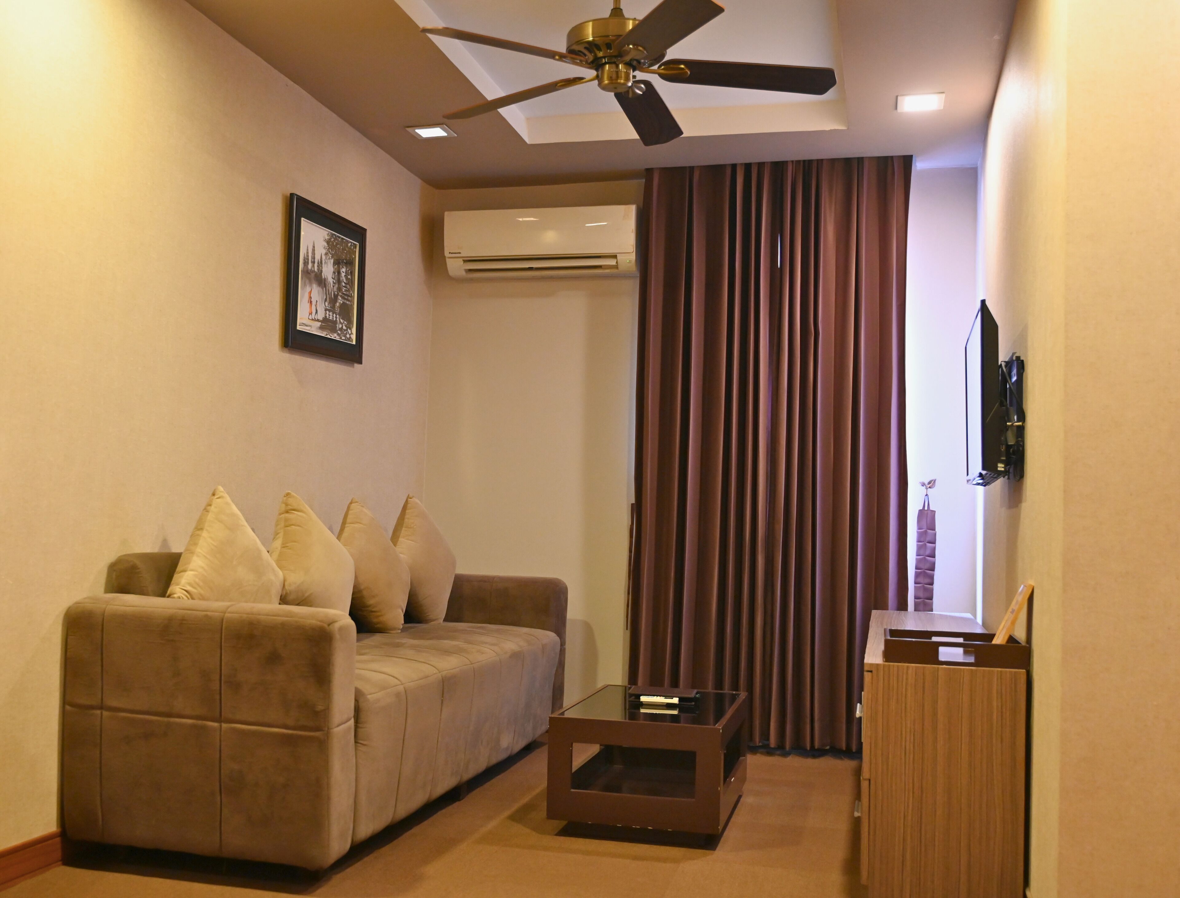 apartment, 1 king bed | living area | tv, fireplace, books