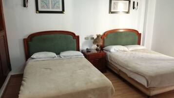 Minibar, desk, blackout drapes, iron/ironing board