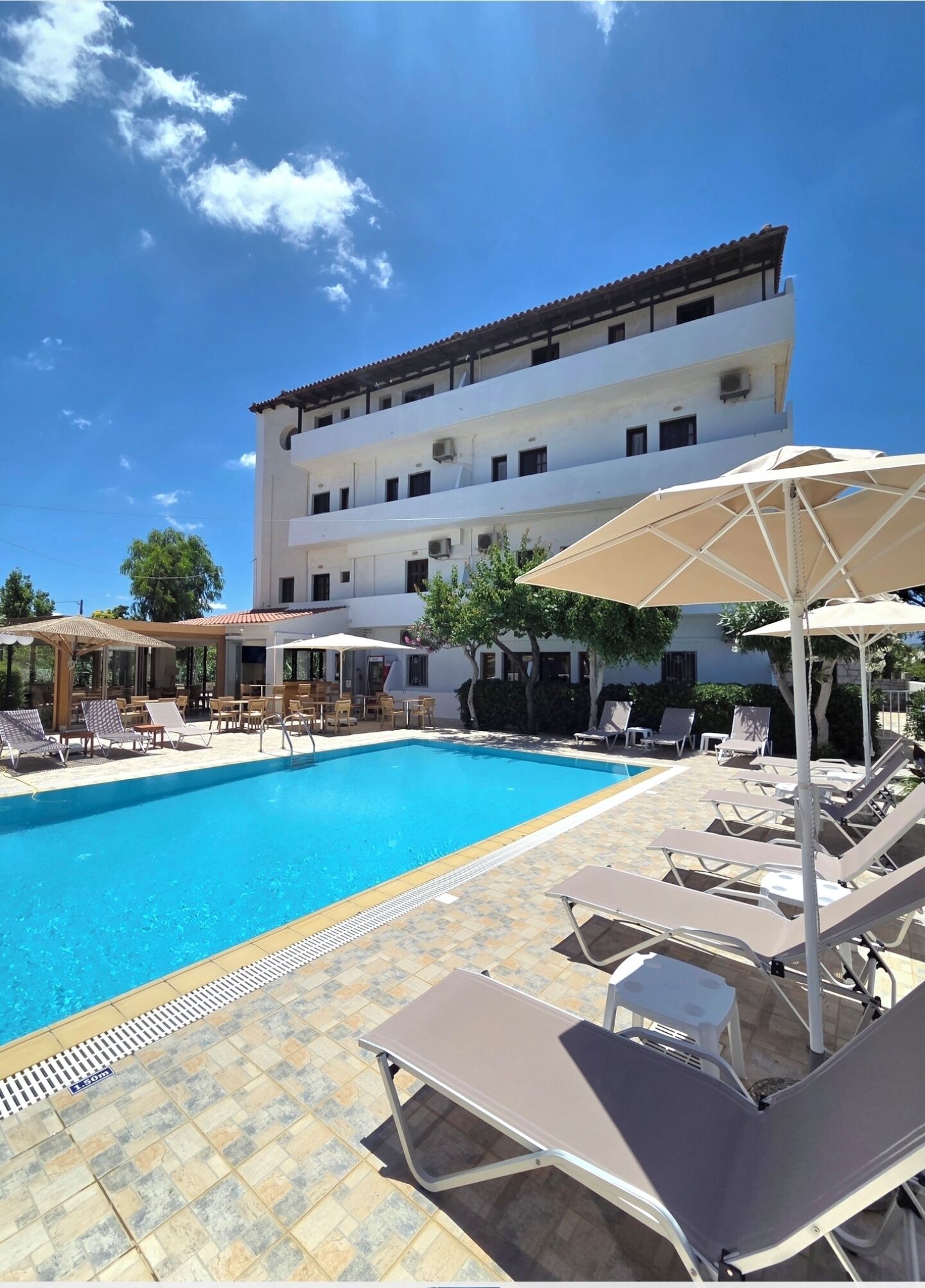 Outdoor pool, pool umbrellas, pool loungers