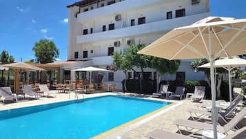 Outdoor pool, pool umbrellas, pool loungers