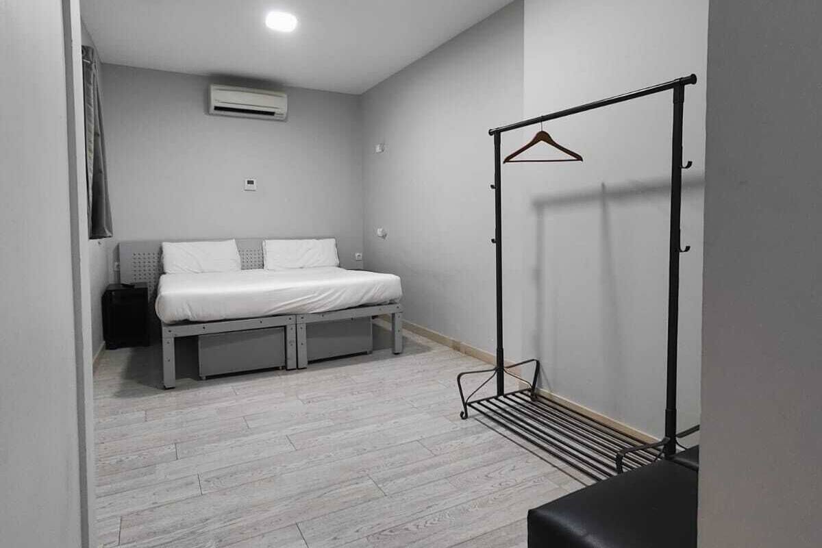 家庭四人房 | 高档床上用品、免费 WiFi、床单