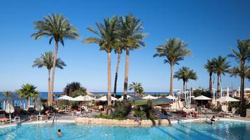 8 outdoor pools, pool umbrellas, pool loungers
