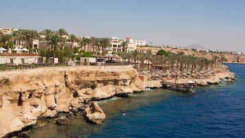 Private beach, white sand, sun-loungers, beach umbrellas