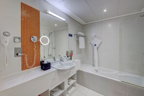 Suite, Sea View | Minibar, in-room safe, desk, iron/ironing board