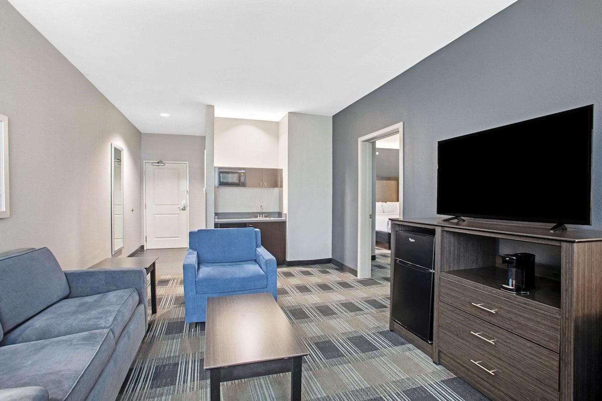 premium bedding, pillow-top beds, desk, laptop workspace