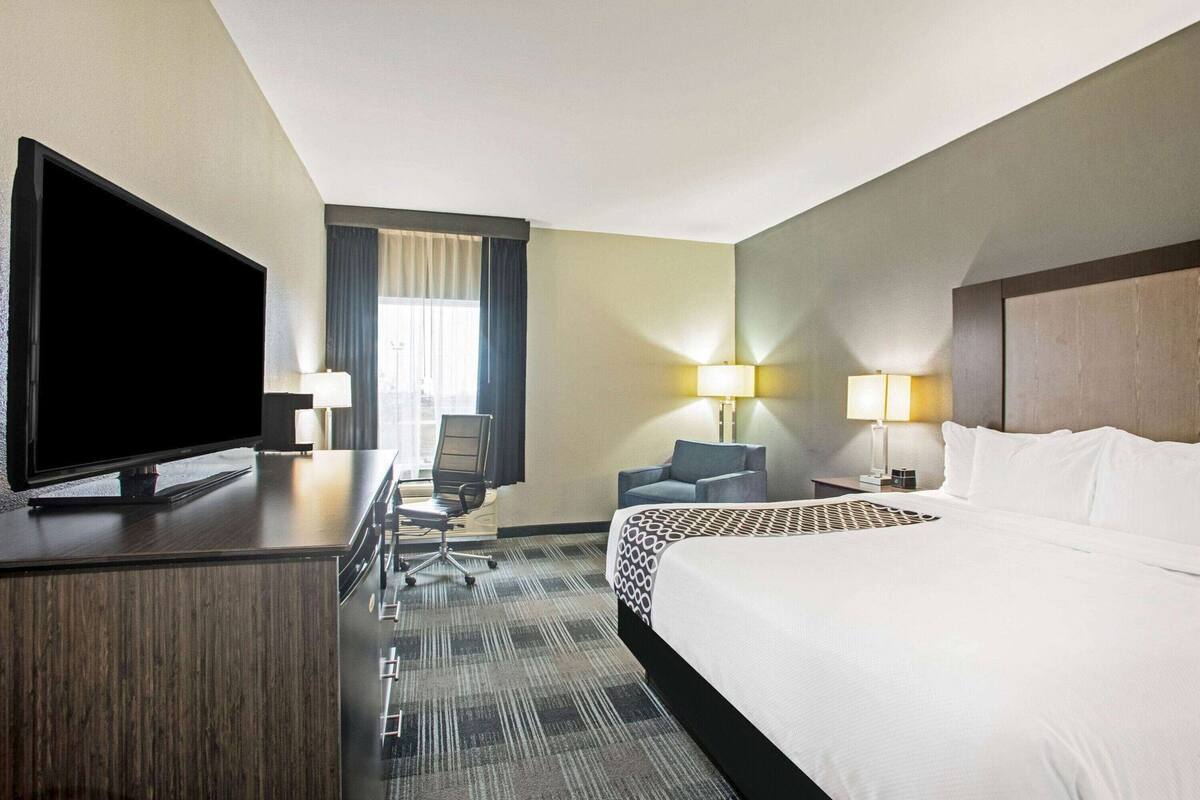 Premium bedding, pillow-top beds, desk, laptop workspace
