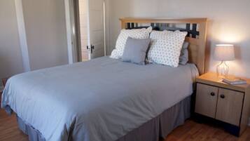 Deluxe Suite, 2 Bedrooms | Memory-foam beds, laptop workspace, blackout curtains