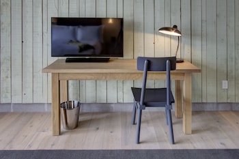 Egyptian cotton sheets, premium bedding, pillowtop beds, in-room safe at The Boro Hotel