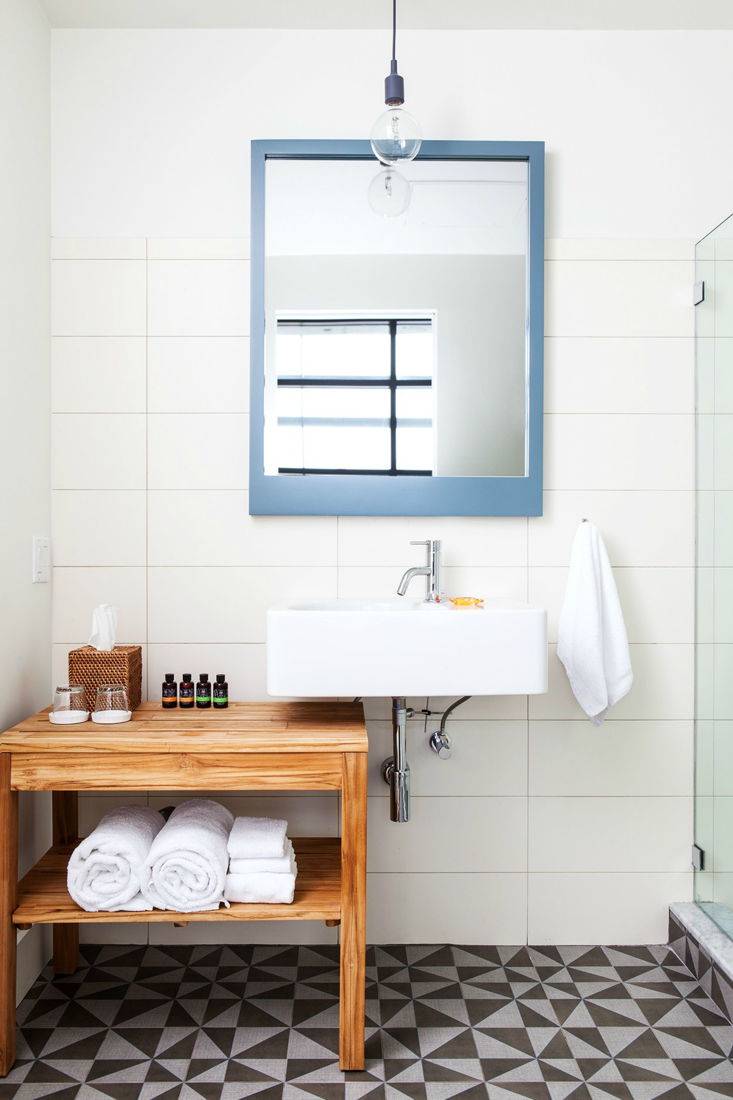 designer toiletries, hair dryer, towels