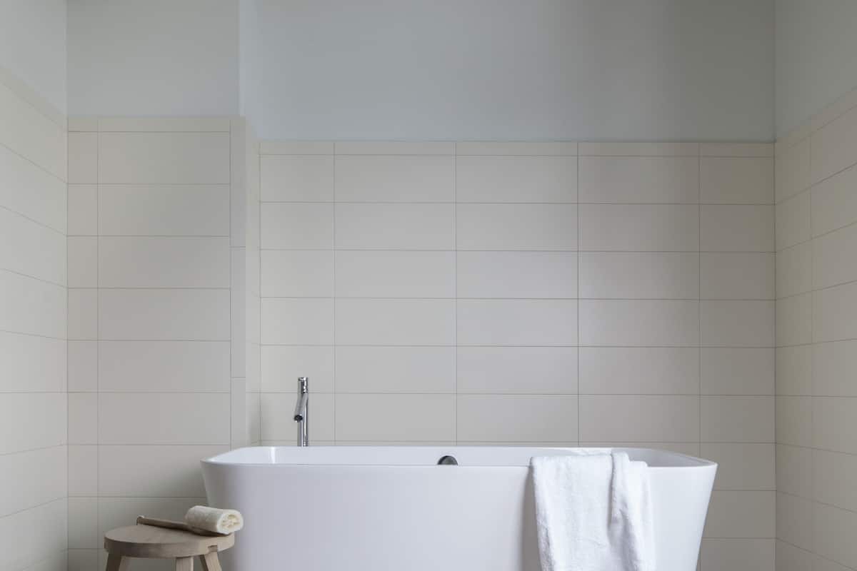 studio balcony king 1 bed tub | bathroom | designer toiletries, hair dryer, towels