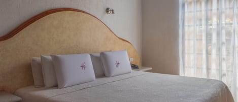 Superior Room | Down comforters, in-room safe, desk, blackout drapes