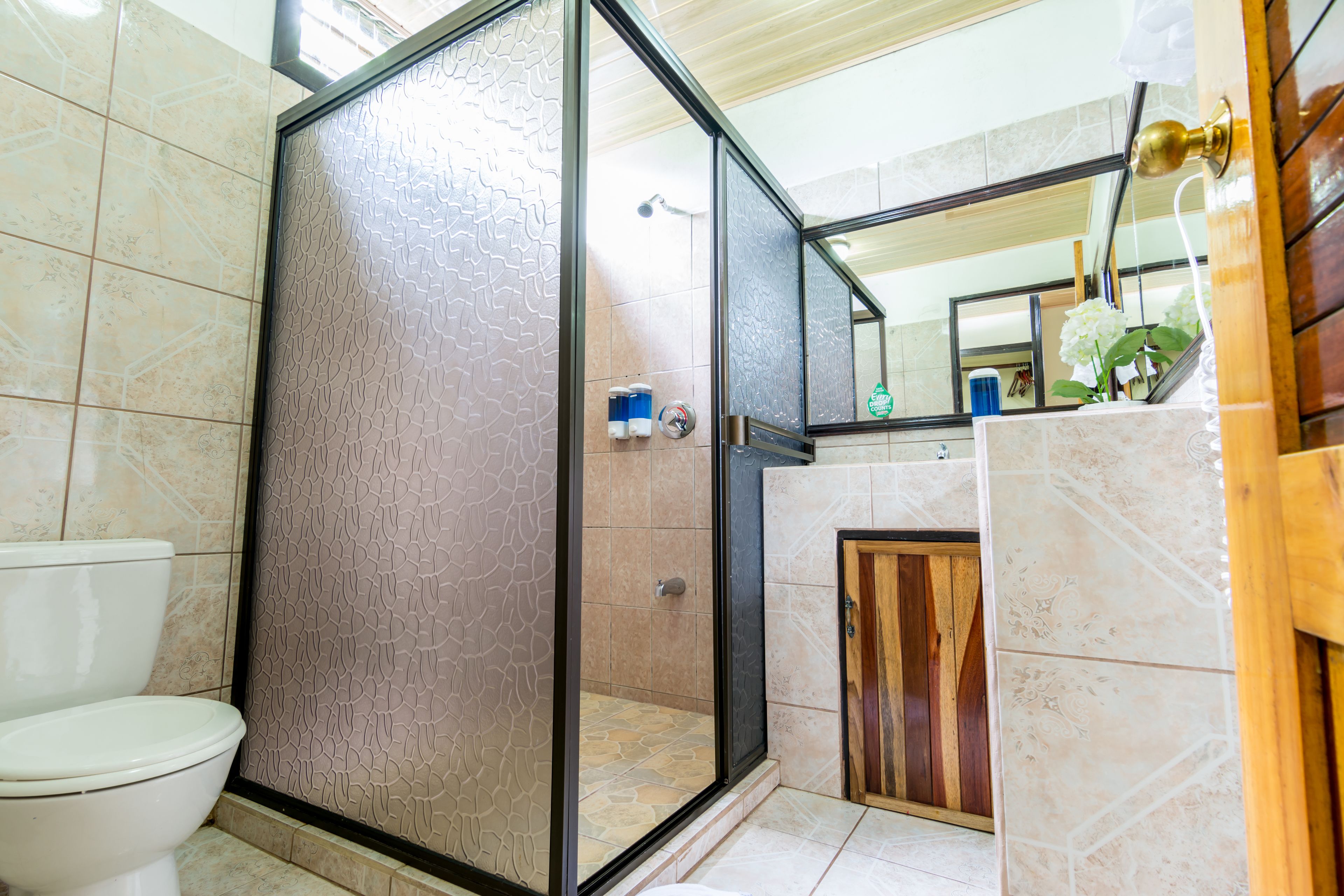 classic quadruple room | bathroom | shower, hair dryer, towels
