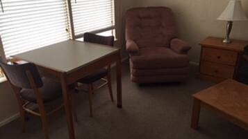 Suite, 1 Bedroom | Living room | Flat-screen TV