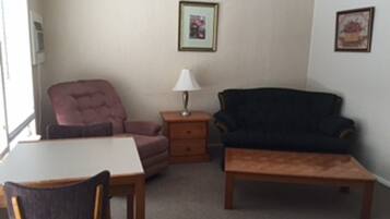 Suite, 1 Bedroom | Living room | Flat-screen TV